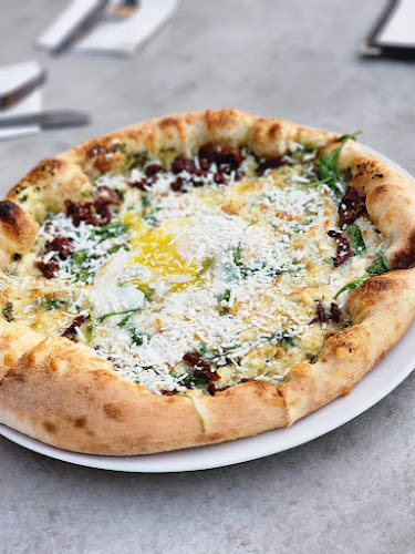 Opinii despre פיצה פורטו איירפורט סיטי în לוד - הסעדה