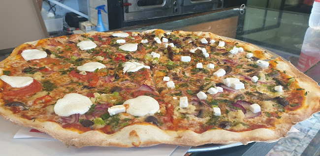 פיצה עגבניה פ"ת | כשר - פיצה איטלקית | סלטים בהרכבה אישית - הסעדה