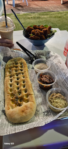 חוף הבתולה מסעדה